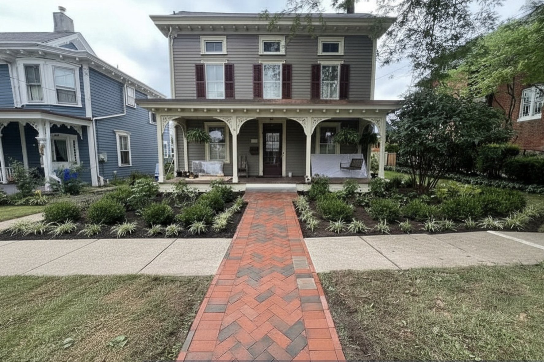 Brick herringbone walkway at Victorian home