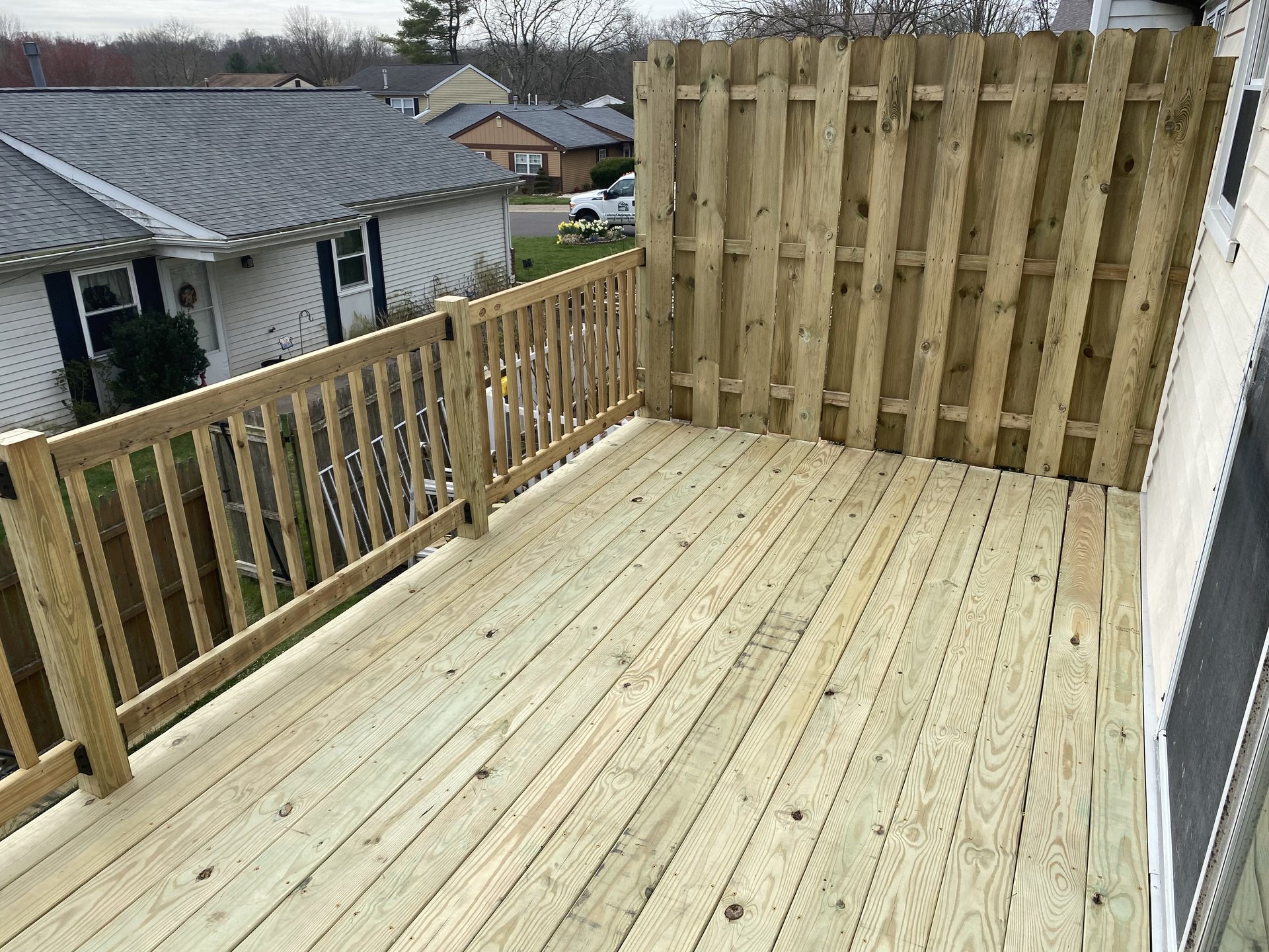 Finished second-story deck with privacy screen